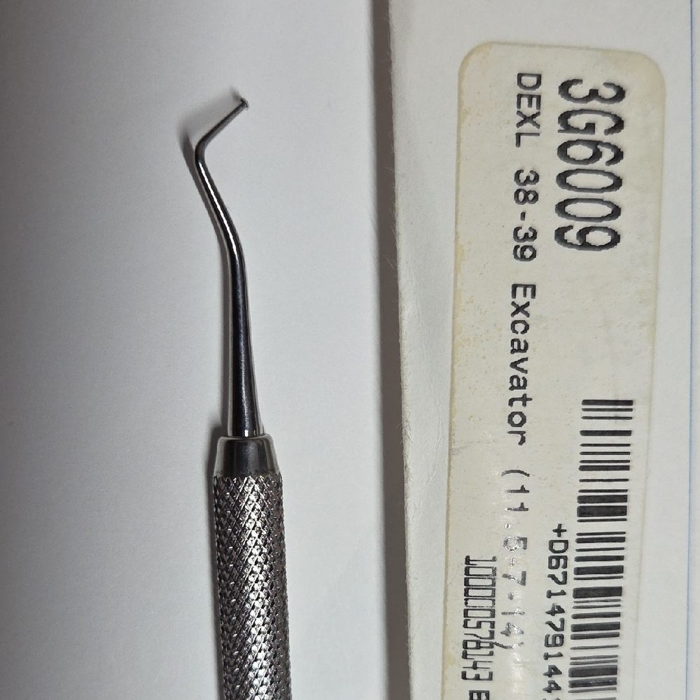 Silver Dental Excavator Tool